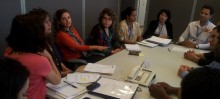 Secretária de Desenvolvimento Social, Habitação e Cidadania, Regina Braga, e representantes da Caixa Econômica Federal